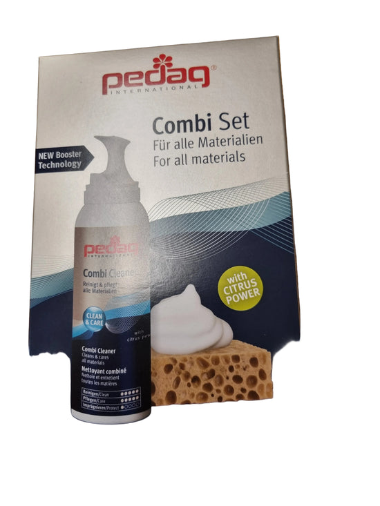 Pedag International Combi Set packaging box for Pedag Combi Cleaner, displayed on a wooden tabletop. The box features the Pedag logo, an illustration of the spray can, a sponge with white foam, and a green 'with citrus power' badge.
